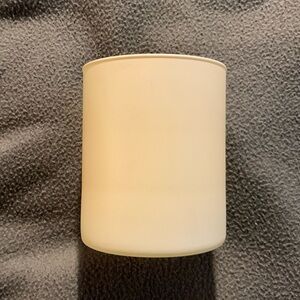 New Candle-lite yellow glass candleholder.  Approximately 3 1/2” x 4”